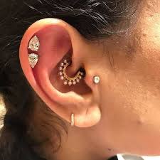 Carefully touch one end of the ring to the piercing hole and rotate the ring, being careful to allow it to slide through the piercing. Daith Piercing Mumsnet