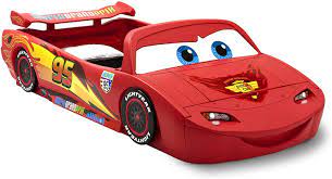 Plus, if the old mattress of your crib fits the new bed so that you can skip getting different sheets and with the new lightning mcqueen toddler bed, your child can pedal to the metal to reach dreamland. Delta Children Cars Disney Pixar Cars Lightning Mcqueen Toddler To Twin Bed With Lights And Toy Box By Delta Children Amazon De Home Kitchen