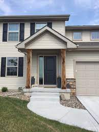 Last fall, we replaced our old shutters with custom built (by me) cedar shutters. Staining Cedar Columns The Brunette One