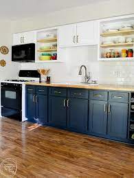 I previously wrote about the white cabinets looked good by themselves, but, we wanted to add a little something special to the above image includes a picture of the butcher block countertop. Remodel Kitchen On A Budget By Replacing The Doors And Painting Them With Alkyd Paint 2 Refresh Living