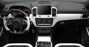 Is there a luxury car with a beige interior? How About This Custom Black White Interior For Mercedes Gle Coupe Carscoops Car Interior Luxury Car Interior Custom Car Interior