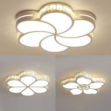 To make the living room shine with a warm glow from within, you should definitely go ahead with our flush mount ceiling light. White Flower Led Flush Mount Light Modern Acrylic Ceiling Light With Crystal For Kid Bedroom Takeluckhome Com