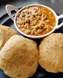 I just love to see chole bhature in a restaurant when served to others. Chole Bhature Chickpeas Curry With Indian Bread Indian Recipes Good To Know Tastyone English