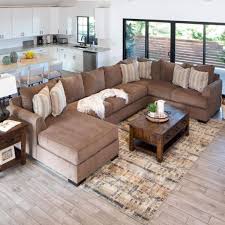 This camel brown colored sofa was. Maxwell Jerome S Furniture