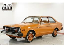 Image result for Gold Bronze 1959 Datsun