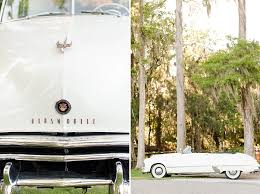 We help you make an unforgettable entrance to your wedding, provide a timeless backdrop for your photos, and send you off in style! Vintage Getaway Cars Candi Leonard Photography
