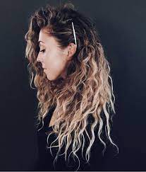 Brunette with blonde highlights 13. 17 Beautiful Ways To Style Blonde Curly Hair Southern Living