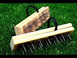 To aerate the lawn, place the homemade aerator on a section of grass, step on it to push it into the ground, and pull it up. Diy How To Make A Lawn Aerator Shoes Youtube