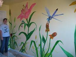 You'll need an artistic person to create the outlines of the mural, but just about anyone with a paintbrush can fill in the rest. Mural Ideas Flower Mural Mural Wall Art Wall Murals