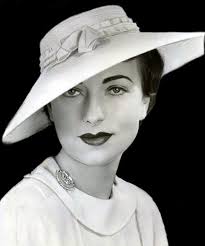 Actress, Agnes Moorehead wearing an elegant chapeau and dainty  brooch,1930's.