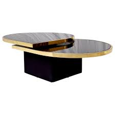About round swivel coffee tables, coffee table items have in a wide variety too. Swivel Brass And Black Glass Cocktail Table By Design Institute Of America At 1stdibs