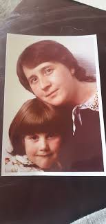 My mum (on the right) with her workmates in front of one of the firm's  cars. They were clerks in a tire selling company . 1978.