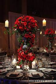 15 Unique Ways To Use Red Roses In Your Wedding Red Centerpieces Red Roses Centerpieces Red Rose Wedding