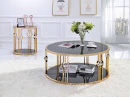 Pick up this teakwood creation that uses triangular corner end table: Daloris 3pc Coffee End Tables Set 81135 In Gold By Acme