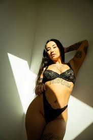 OnlyFans Model in black - FameRegistry.com