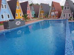The unique triangular houses, is filled with colourful exterior and an outdoor swimming pool for both adults and children, perfect for a family vacation. Masbro Village Homestays Melaka
