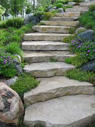 The clean design of these stairs is perfect for these stone steps combine well cut stone with rough textured stone. Pin By Dan Ashbach Dan330 On Pathways Diy Garden Steps Garden Steps Garden Stairs