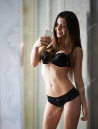 Girl in lingerie makes a photo of yourself Stock Photo by ©Artranq 58216903