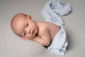 Newborn photography in the comfort of your own home. I bring blankets,  outfits, and props to your home so you can choose. Babies and new moms feel  a lot better at home.