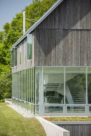 But protecting her might be the easiest part of the job as you move into charlotte's house and live with one of the world's most beautiful models. Modern Barn House Built Into A Hillside Meadow