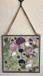 Vodka — vodka, or any alcohol, may have a preserving effect halting ethylene production which is the gas that makes flowers wilt. 14 Most Unique Ways To Preserve Your Wedding Bouquet Photos Wedding Bouquet Preservation Bridal Bouquet Handmade Wall Hangings