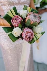 Greenery and white wedding bouquet. Tropical White Gold And Green Wedding