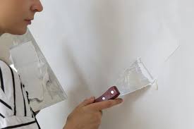 Embed mesh or paper tape in joint compound over the hole (photo 2). How To Patch Holes In Drywall Diy True Value Projects True Value
