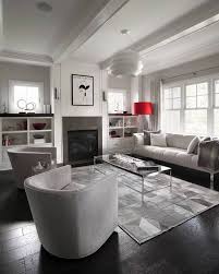 The room also offers gray couches and a glass top center table set on a large gray area rug. 23 Gray Couch Living Room Ideas Best Rooms With Gray Couches