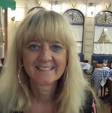 What ideas and pictures are available for replacing a wood deck around a  pool?