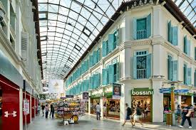 Replete with convenience at the doorstep, the adjoining bugis junction shopping mall which spans over 200 retail and dining outlets, offers a prelude to what the exciting destination has to offer. Architectural Photography Of Bugis Junction In Singapore