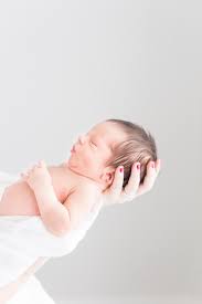 White Natural Light Studio Newborn Photography Ohio Newborn Photographer Mom Holding Newborn Baby Photoshoot Newborn Photography Boy Newborn Baby Photography