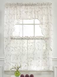 blank window wall besides curtains and
