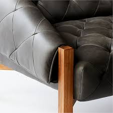 Abruzzo Black Leather Tufted Chair With Brown Legs Cb2