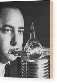 Dr. Theodore Maiman Looking At The Ruby Wood Print by Bettmann