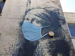Created by curbsandstoopsa community for 10 years. Banksy S The Girl With The Pierced Eardrum Adorned With Giant Face Mask Amid Coronavirus Pandemic The Independent The Independent