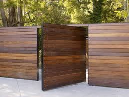 These boards are made from real lumber and provide an excellent perimeter for your yard. Modern Wood Fence Designs