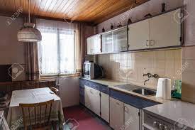 Combining the kitchen with the living room not necessarily mean the complete fusion of styles, textures, and design techniques. Interior Of An Old Simple Kitchen That Should Be Renovated Stock Photo Picture And Royalty Free Image Image 46327703