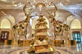 Electric Light Bulb Christmas Tree And Golden Reindeer At Four Seasons Hotel Fun Christmas Decorations Beautiful Christmas Decorations Indoor Christmas Lights