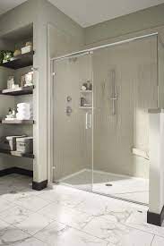 Low Threshold Walk In Shower With Corner Bench And Handheld Shower Wand Makes This Ada Shower Feel More Like Vertical Shower Tile Ada Shower Bathroom Solutions