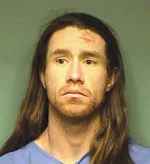 Police take suspect from roof