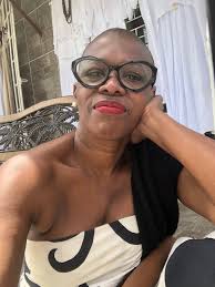 Here I am sitting in front of Ted Arthur Leather Collections store in  Scarborough. Listen. Tobago people know and clearly love me. The amount of  people pass and call me out from