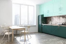 It was a real pleasure working with zsolt and his. White And Marble Wall Kitchen Corner With A Wooden Floor Green Stock Photo Picture And Royalty Free Image Image 107017295