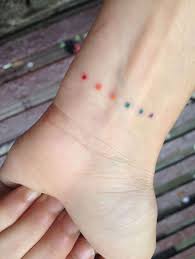 Rainbow Dots Tattoo Wrist Tattoos For Guys Rainbow Tattoos Subtle Tattoos