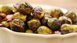 Toss the brussels sprouts with olive oil so they are completely coated. How To Make Maple Roasted Brussels Sprouts With Bacon Thanksgiving Recipes Allrecipes Com Youtube