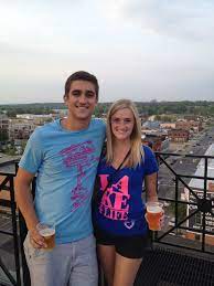 Chris And Lara Wearing The Outboard Motor Tee And The Philly Love V Neck Greatlakes Kalamazoo Michigan Lake4life Women Kalamazoo Egift Card