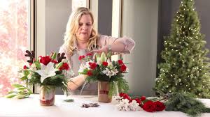 Traditional holiday flowers in classic christmas colors instantly warm up the home. How To Make The Ftd Shine Bright Bouquet Youtube