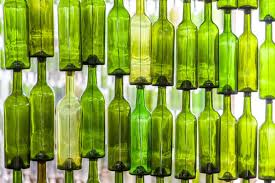 How to build a glass bottle garden wall. How To Reuse Glass Bottles In The Garden