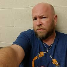 Which sports card is more valuable, Tom Brady or D.K. Metcalf?