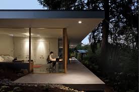 Beautiful central courtyard in an home that is shut away from urban life with bamboo modern interior. Contemporary Courtyard House For Multi Generational Living