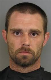 Toddler was struck against door jamb, warrant says